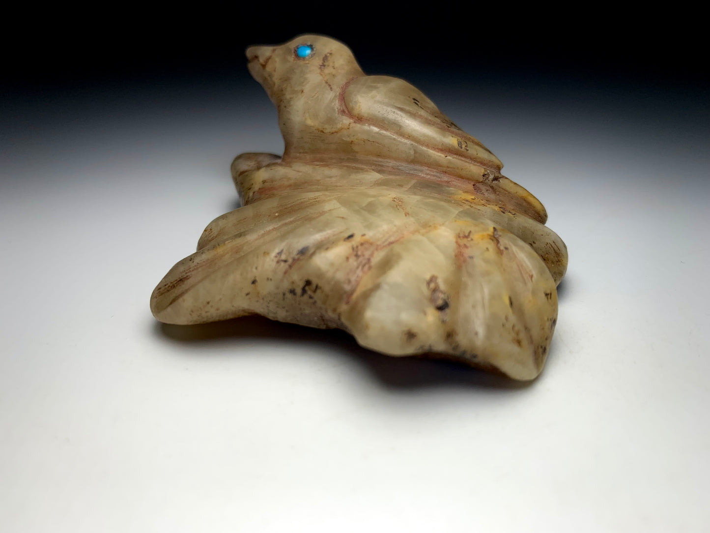 Mid Century Native Zuni Carved Honey Travertine Bird on Leaf Fetish By Leekya Deyuse (d.)